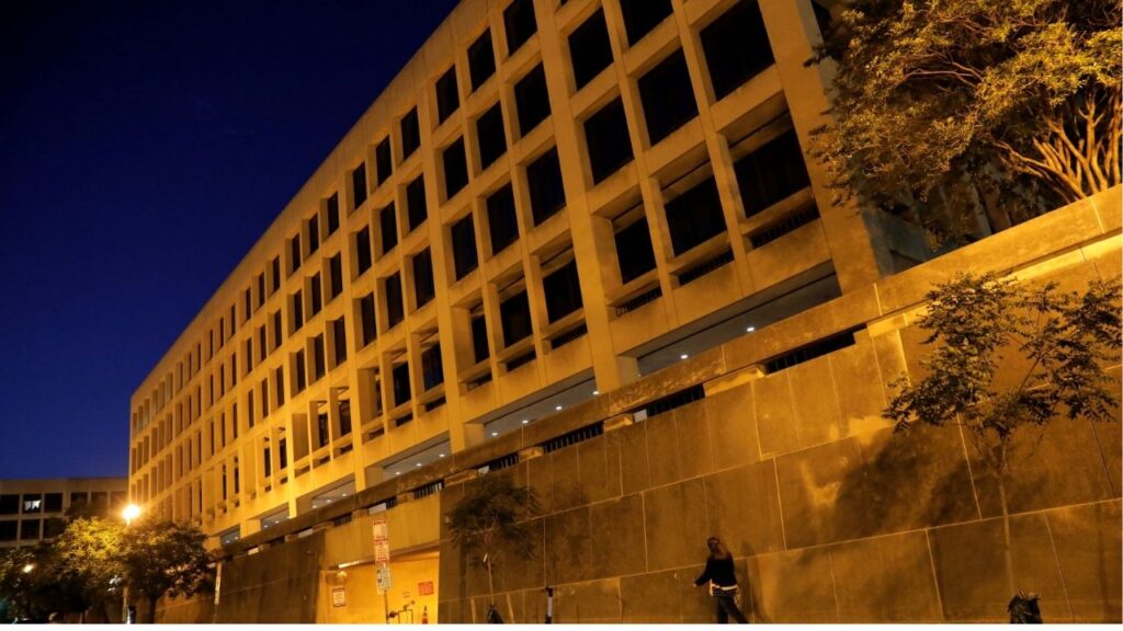 A person walks by the Department of Labor headquarters in Washington, D.C., U.S., May 13, 2021. (Reuters File)