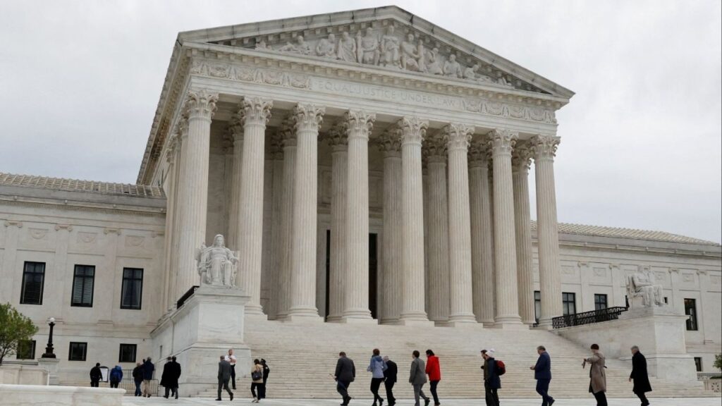 People walk across the plaza of the U.S. Supreme Court building on the first day of the court's new term in Washington, U.S. October 3, 2022. (Reuters File)