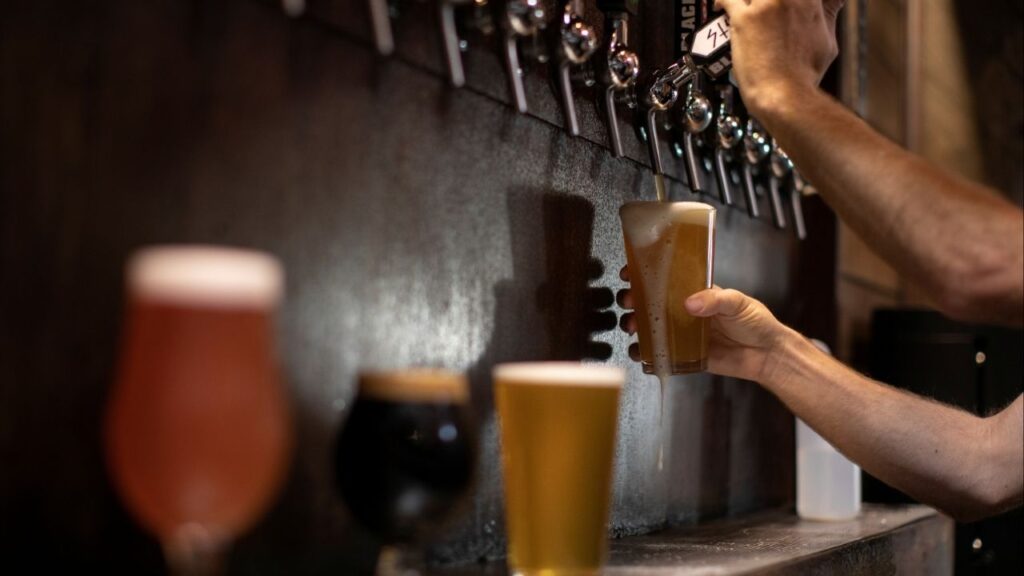 Beer is poured from a tap at a brewery in Oceanside, California, U.S., October 15, 2020. (Reuters File)