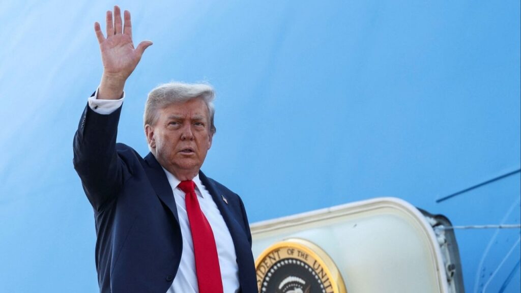 U.S. President Donald Trump waves while boarding Air Force One, as he departs for Alaska to meet with Russian President Vladimir Putin to negotiate for an end to the war in Ukraine, from Joint Base Andrews in Maryland, U.S., August 15, 2025. (Reuters/Kevin Lamarque)