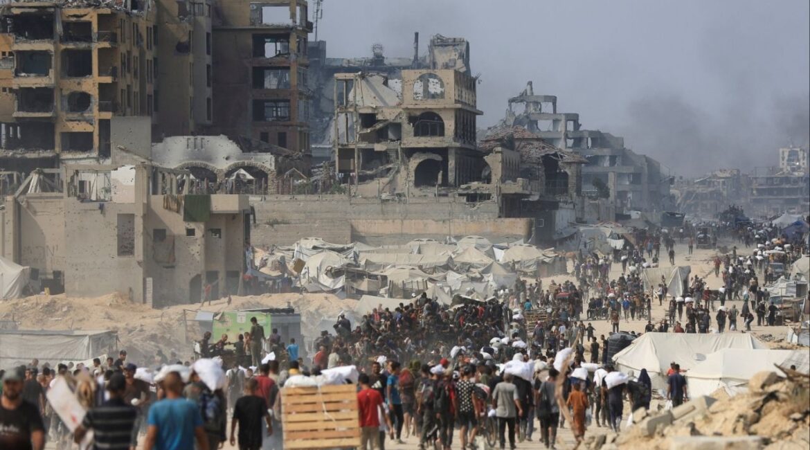 Palestinians carry aid supplies they collected from trucks that entered Gaza through Israel, in Beit Lahia, in the northern Gaza Strip August 10, 2025. (Reuters File)