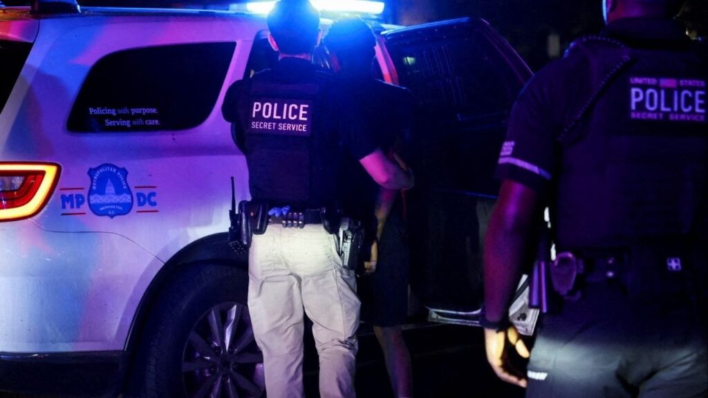 Police detain a person in the Brightwood neighborhood after U.S. President Donald Trump's announcement of the federal takeover of the Metropolitan Police Department under the Home Rule Act and the deployment of the National Guard to assist in crime prevention in the nation's capital, in Washington, D.C., U.S., August 14, 2025. (Reuters File)