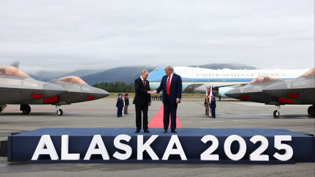 U.S. President Donald Trump goes to shake hands with Russian President Vladimir Putin, as they meet to negotiate for an end to the war in Ukraine, at Joint Base Elmendorf-Richardson in Anchorage, Alaska, U.S., August 15, 2025. (Reuters/Kevin Lamarque)