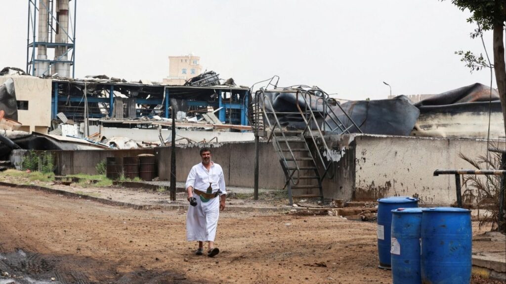 A worker walks at the Hiziaz power station after it was attacked by Israeli missile strikes in Sanaa, Yemen August 17, 2025. (Reuters/Khaled Abdullah)