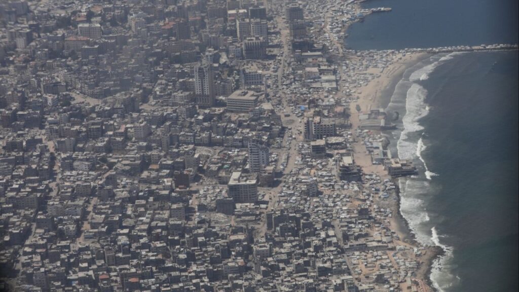 An aerial view from a Jordanian military aircraft shows the Gaza Strip, before humanitarian aid is airdropped over it, in Gaza, August 17, 2025. (Reuters File)