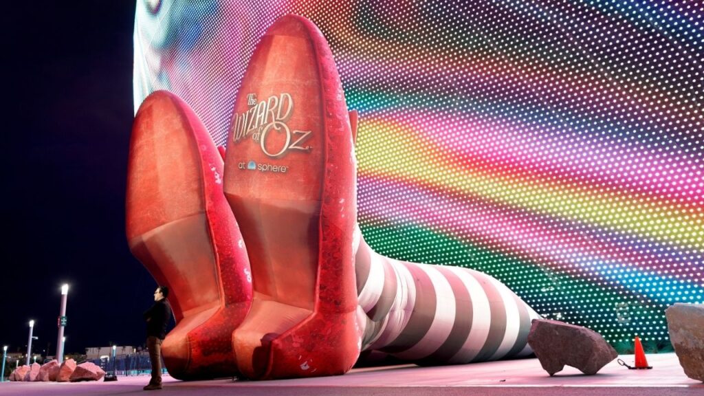 A display of 50-feet-long legs and 22-feet-tall ruby slippers, a promotion for the upcoming "Wizard of Oz at Sphere" movie, in Las Vegas, Nevada, U.S., August 20, 2025. (Reuters/Steve Marcus)