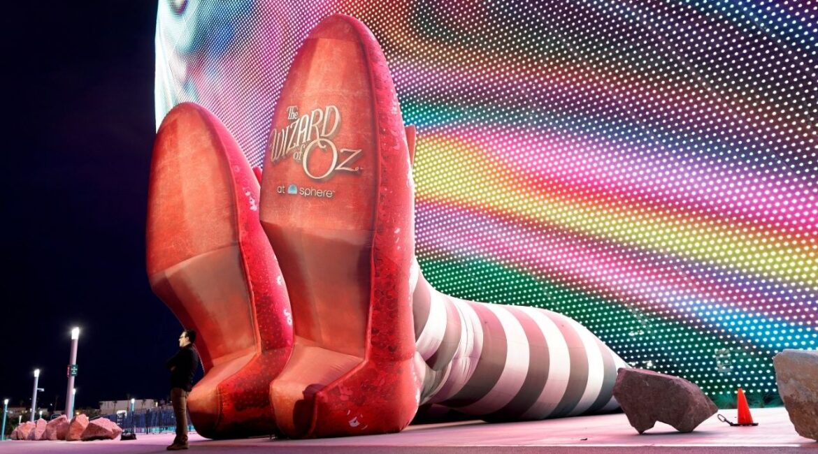 A display of 50-feet-long legs and 22-feet-tall ruby slippers, a promotion for the upcoming "Wizard of Oz at Sphere" movie, in Las Vegas, Nevada, U.S., August 20, 2025. (Reuters/Steve Marcus)