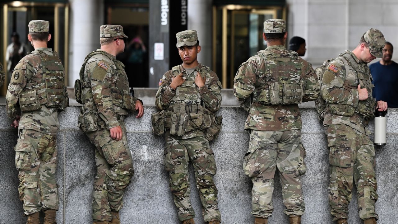 Soldiers with the 30th Armored Combat Brigade from the South Carolina National Guard at Union Station in Washington, Aug. 20, 2025. Defense Secretary Pete Hegseth has authorized National Guard troops deployed to Washington to bring their weapons with them on their mission. (Kenny Holston/The New York Times)