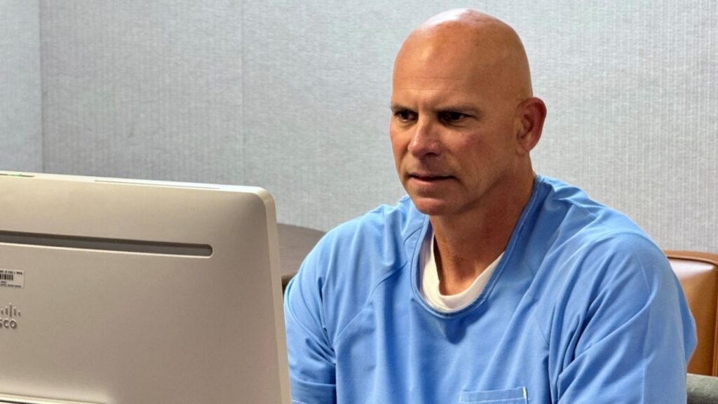 Lyle Menendez attends his Board of Parole hearing online from the Richard J. Donovan Correctional Facility in San Diego, California, U.S., August 22, 2025, that could lead to freedom after decades in prison for the 1989 shotgun murders of his parents. The final decision will rest with the governor, who can either accept or reject the board's recommendation. California Department of Corrections and Rehabilitation/Handout via REUTERS