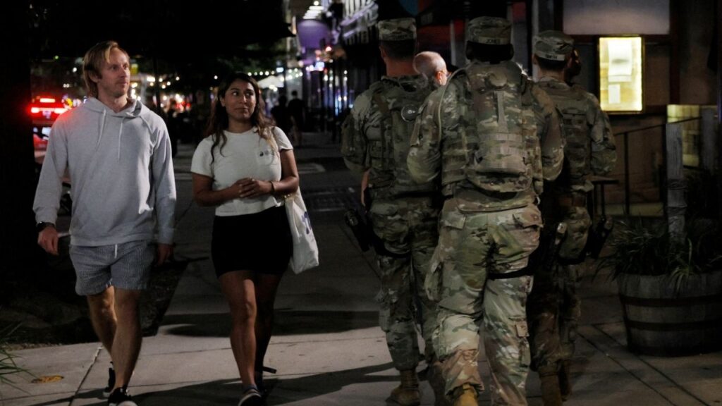 Members of the Ohio National Guard wear their sidearms while patrolling the Logan Circle neighborhood in Washington, D.C., U.S., August 24, 2025. (Reuters/Brian Snyder)