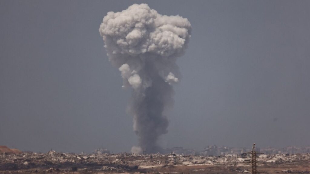 Smoke rises from Gaza after an explosion, as seen from the Israeli side of the border, August 25, 2025. (Reuters/Amir Cohen)