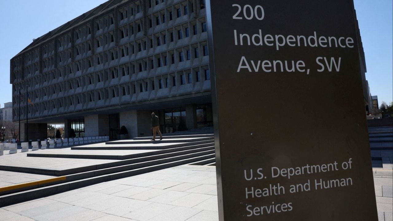 A person walks outside of the U.S. Department of Health and Human Services building after it was reported that the HHS will cut about 10,000 full-time jobs and close half of its regional offices, a major overhaul of the department under Health Secretary Robert F. Kennedy Jr., in Washington, D.C., U.S., March 27, 2025. (Reuters File)
