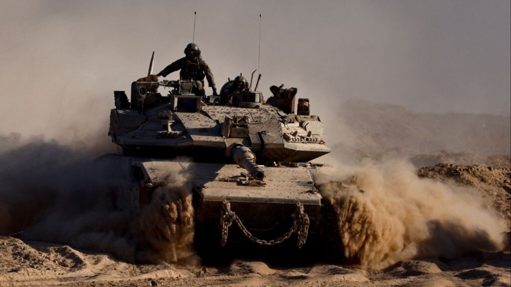 An Israeli tank manouvres at the Israel-Gaza border, as seen from Israel, August 26, 2025. (Reuters File)