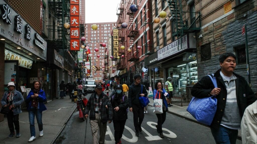 Tourists and pedestrians walk down Pell Street in the Chinatown neighborhood of Manhattan in New York City, U.S., April 14, 2025. (Reuters File)